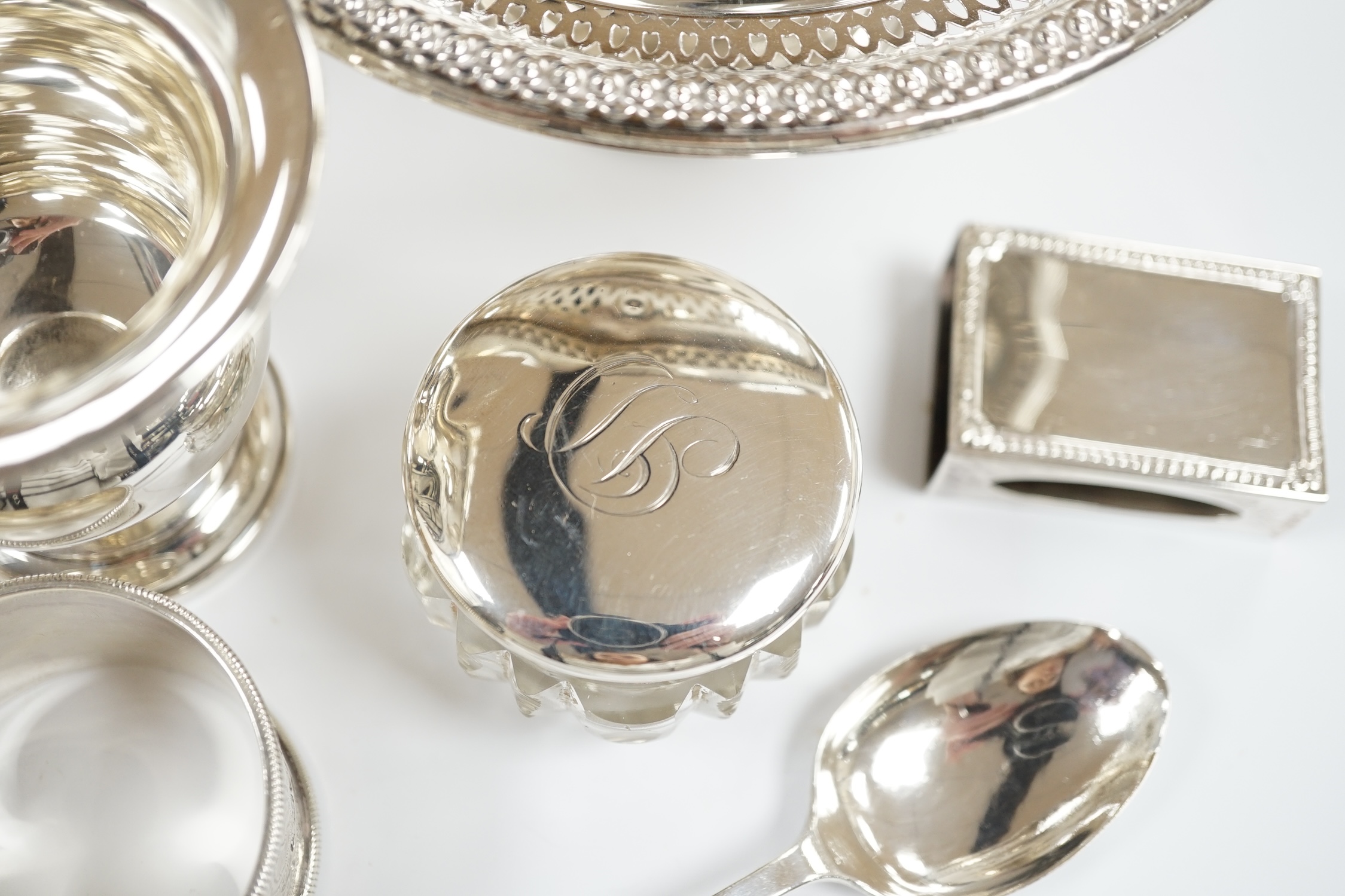 Sundry small silver including a bell shaped inkwell, modern card case, cigarette case, small spoon, napkin ring, pill box, sterling bowl etc.